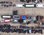 UK asylum hotel numbers halve within a year