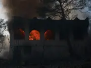 UK Foreign Office warns travellers to Greece as wildfires kill two