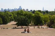 UK heatwave alert as temperatures near 32C and Scotland hit by rain
