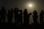 UK stargazers treated to solar eclipse and Perseid meteor shower