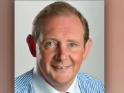 University of Greater Manchester VC George Holmes contract ended