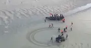 Video shows French police attacked by migrants during boat interception