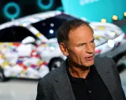 VW workers boo CEO Blume as he urges 'pull together' amid job cuts