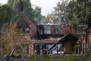 Wildfire in West Midlands destroys 19 homes on hottest day