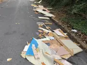 Wirral driver swerves to avoid huge fly-tip on Red Hill Road