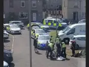 Woman arrested after two cops injured in alleged hit and run