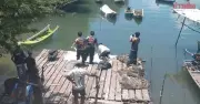 Woman found chained by neck to dumbbells underwater in Thailand