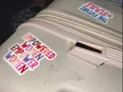 Woman shocked by offensive graffiti on suitcase after Manchester Airport flight
