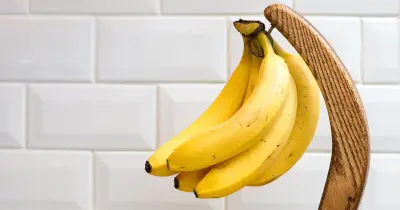 Banana storage hack: cling film on stems keeps fruit fresh longer