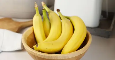 Bananas last longer without turning brown if stored with 1 kitchen item