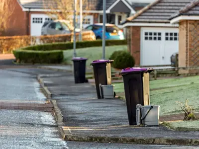 Binman's simple trick to stop bins blowing away in windy weather