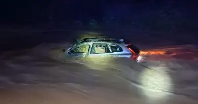 Brit dies as car swept away by floods near Barcelona