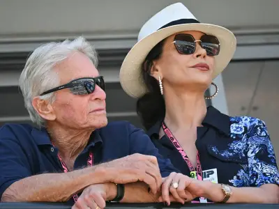 Catherine Zeta-Jones, 57, and Michael Douglas, 82, share sea kiss for joint birthday