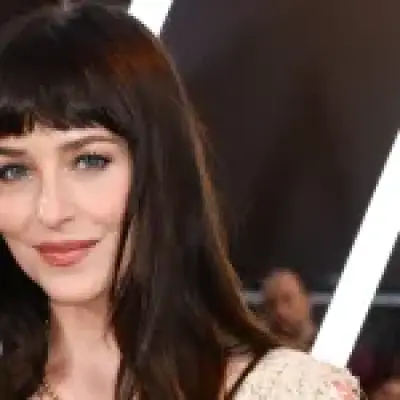 Dakota Johnson stuns in sheer lace dress at Verity premiere
