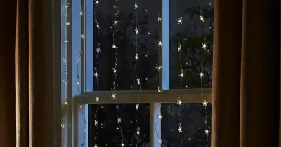 Dunelm's 156 LED Star Curtain Lights Charm Shoppers at £16