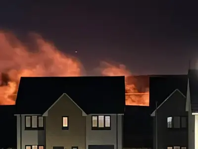 Huge field fire in Fife near homes as firefighters remain at scene