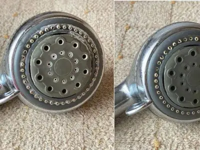 Limescale on shower head cleaned in 10 minutes with citric acid