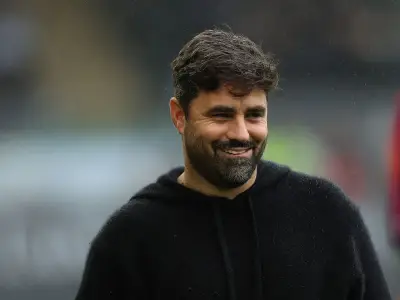 Matos plays down Swansea's top spot despite Burnley win