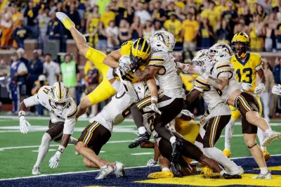 Michigan stun Western Michigan with controversial last-second Hail Mary