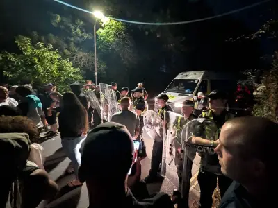 Riot police clash with protesters in Portsmouth after migrant boat rescue