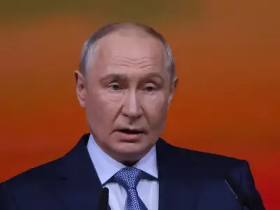 Russia expands military as Putin denies Europe attack plans
