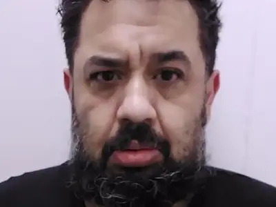 Son jailed for 22 years after strangling mother and calling sex line