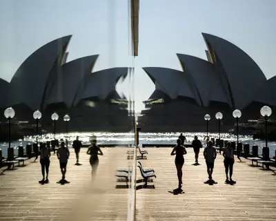 Sydney set to hit 33C in warmest start to spring since mid-1800s – while snow forecast in southern NSW