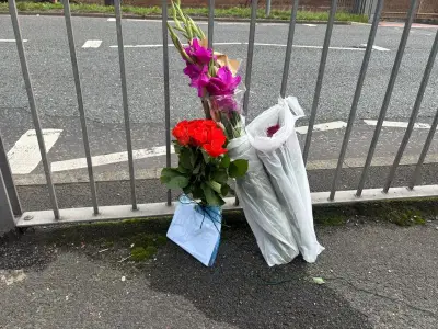 Tributes left at scene where woman died after being hit by taxi