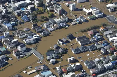 Typhoon Dujuan kills six in Japan as record rainfall nears Tokyo