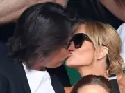 Amanda Holden reveals 10-a-day kissing habit with husband Chris