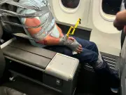 American Airlines passenger duct-taped to seat after violent outburst