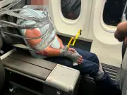 American Airlines passenger duct-taped to seat after violent racist outburst