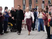 Andy Burnham's wife wears £46 Next burgundy skirt in Liverpool