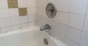 Bathroom mould disappears overnight with 2 staple items