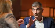 BBC boss suggests lower fee if everyone pays household levy