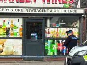 Bootle newsagents shot at; two masked men seen fleeing