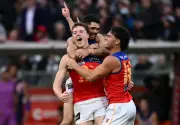 Brisbane roar back to seal three-peat and break Fremantle hearts in AFL grand final classic