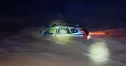 Brit dies as car swept away by floods near Barcelona