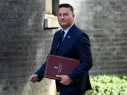 Brits urged to stockpile cash, water and tinned goods