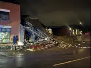 Car crashes into Bolton shop causing building collapse and road closure