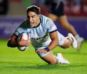 Carreras magic helps Bath overpower Harlequins in season opener