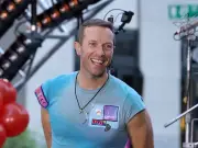 Chris Martin's cryptic 'love' badge sparks Dakota Johnson speculation