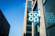 Co-op reports widened losses but sees sales recovery