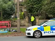 Counter terror police search Salford hostel after two arrests in Manchester