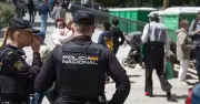 Couple arrested in Spain after allegedly hiding dead father's body to claim pension