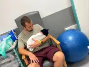 Dad delivers own daughters in two surprise home births four years apart