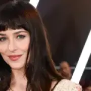 Dakota Johnson stuns in sheer lace dress at Verity premiere