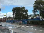Elderly lollipop man hit by car outside Greater Manchester school