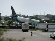 Five dead as Amazon cargo jet veers off Miami runway and bursts into flames