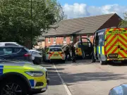 Four in court over baby found dead in towel and bag